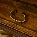 Aged and worn desk drawer.