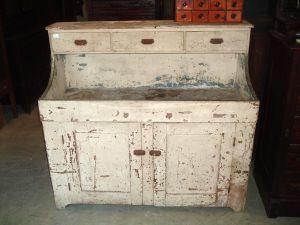 Antique Dry Sink with old peeling paint.