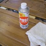 Wiping down cabinet doors with Paso liquid cleaner/deglosser.