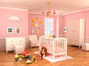 Nicely painted and decorated pink baby nursery.