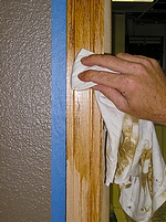 Remove excess stain with a rag.