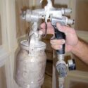 A Cap Spray HVLP cup gun in use.