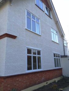 Textured wall coatings on a house in Farnborough.