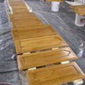 Staining and sealing maple kitchen cabinets.