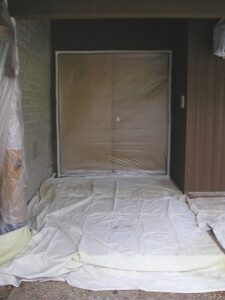 Fully covered and masked entry way ready for painting.