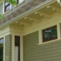 Older house with lap siding and defined soffits.