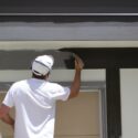 Painting exterior wood trim.