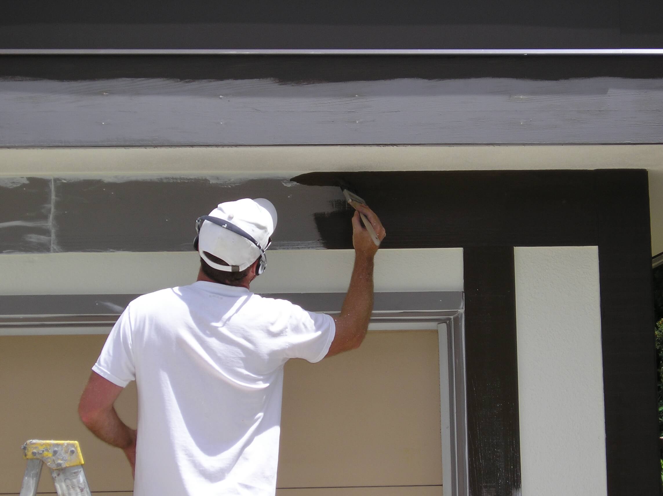 Painting exterior wood trim.