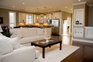 Decorated traditional open kitchen and living room combo..