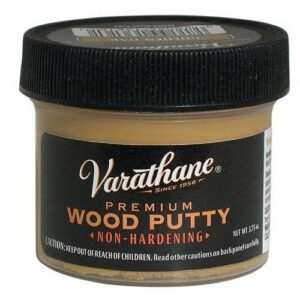 A small jar of colored wood putty from Varathane