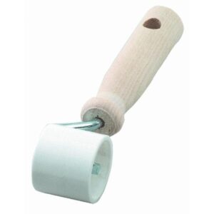 A seam roller used when hanging wallpaper.