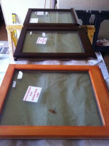 A wood dye applied before applying a wiping stain to pine window sashes.