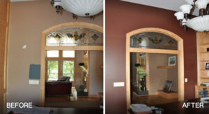 A large living room painted with Terracotta red accents.