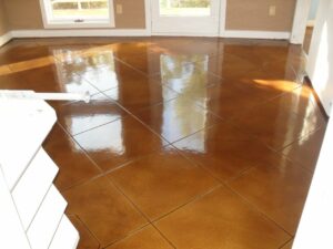 A stained concrete floor with gloss sealer applied.