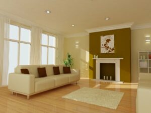 A simple modern living space painted with neutral white and an accent wall.